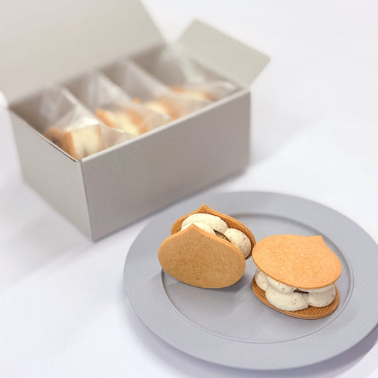 えな栗きんとんの生バターサンド4個入りの箱とお皿